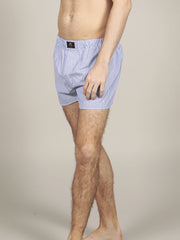Male model wearing striped cotton boxers in mauve