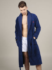 Model wearing luxurious navy cotton bathrobe