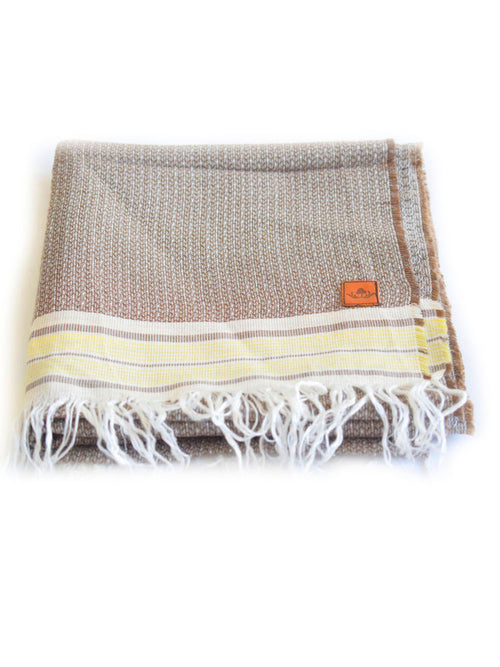 The Cotton® logo tab on the reverse scarf side.