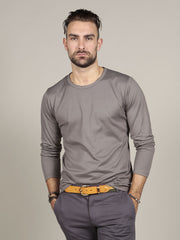Model wearing canvas belt with grey trousers and grey t-shirt