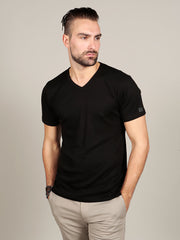 Model wearing Supima cotton Short Sleeve V Neck - Black t-shirt