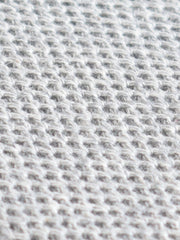 Compact weave for knitted tie