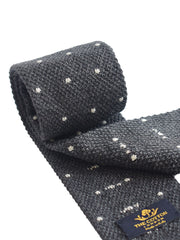 Pindot motif for knitted tie