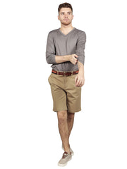 Model wearing slim fit chino shorts in khaki